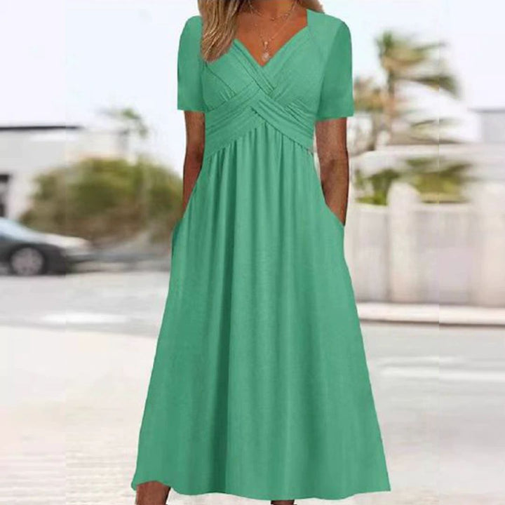 Elegantes, tailliertes Damenkleid. Vielseitiges Sommer- oder Abendkleid für stilvolle Anlässe. Bequem & modern.
