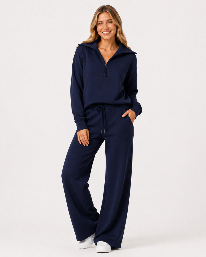 Entspannter Damen Freizeitanzug: Sweatshirt mit Reißverschlusskragen & weite Hose für Komfort.