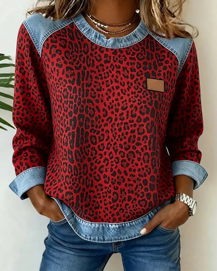 Detailaufnahme: Damen Pullover mit auffälligem Leopardenmuster, Patchwork & praktischem Reißverschluss-Stehkragen.