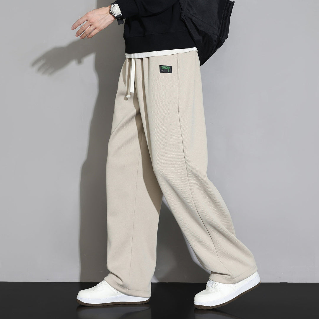 Stylische Herren-Jogginghose, gerades Bein, locker sitzend, vielseitig einsetzbar.