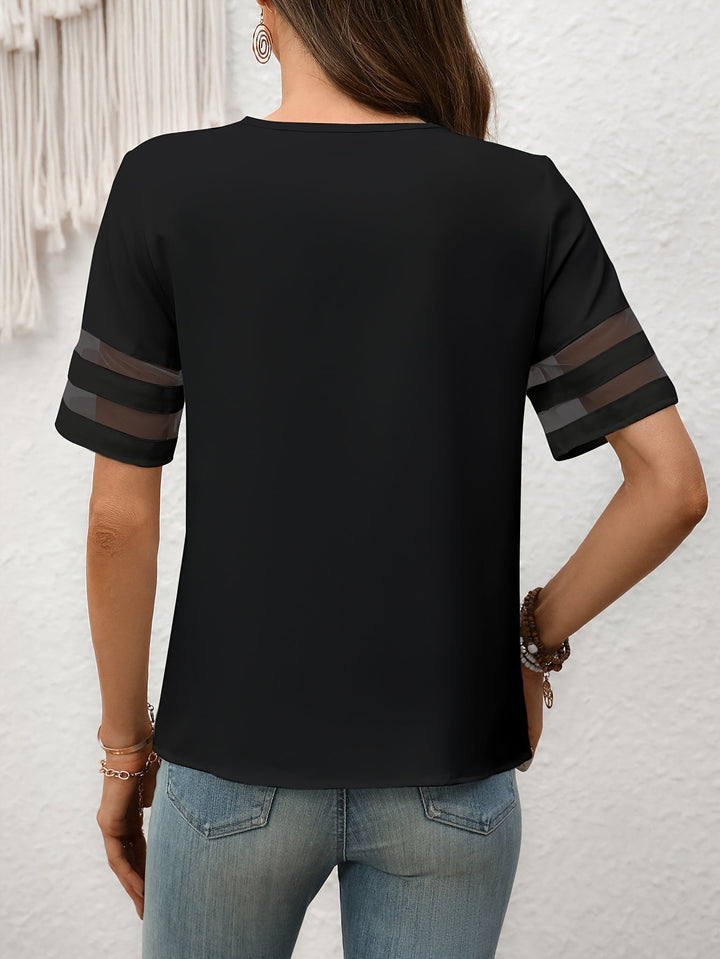 Damenmode Oberteil: Asymmetrische Bluse mit Blumenmuster, kurzärmlig, für sommerliche Eleganz.