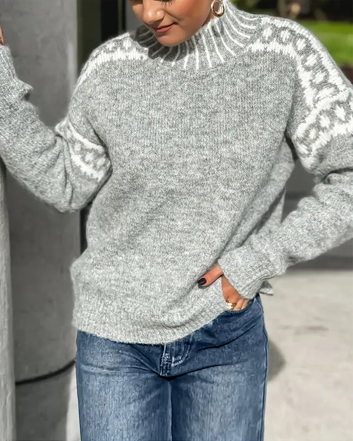 Damen Strickpullover mit Norwegermuster in Grau. Modisch & warm kombiniert für einen gemütlichen Winterlook.
