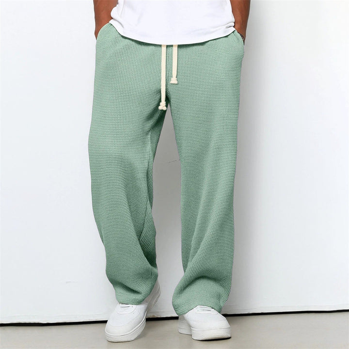 Robuste Herrenhose mit lockerem Schnitt & geradem Bein. Ideal als bequeme Freizeithose oder praktische Sporthose.