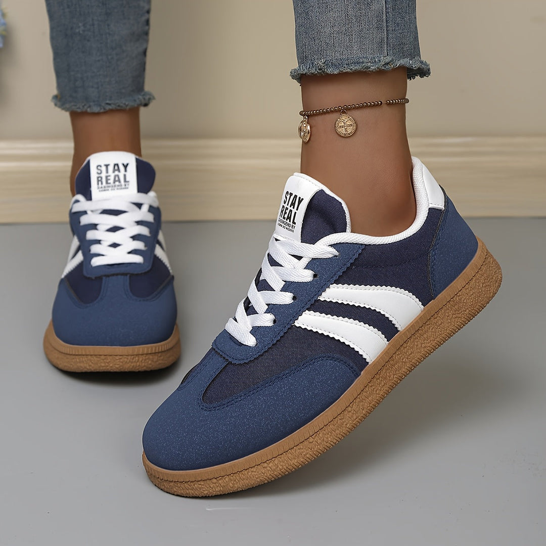 Stylische lila Damen Retro Sneaker, bequeme Alltagsschuhe mit Vintage-Flair.