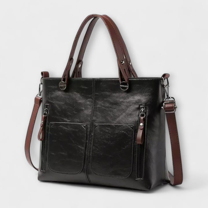 Elegante Damen Lederhandtasche in minimalistischem Design. Klassisch, funktional und langlebig.