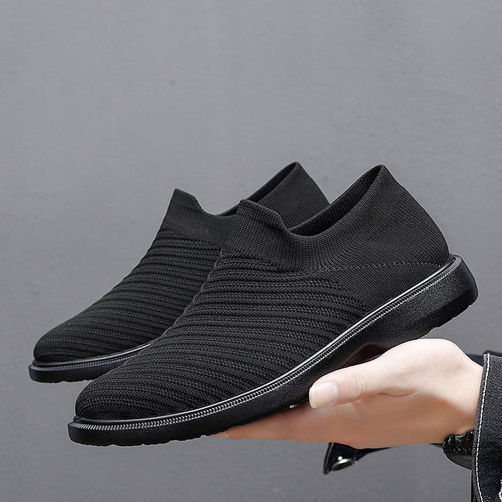 Schwarze Herren Sommer Sneaker, leicht & atmungsaktiv für den Alltag. Bequeme Freizeitschuhe mit flacher Sohle.