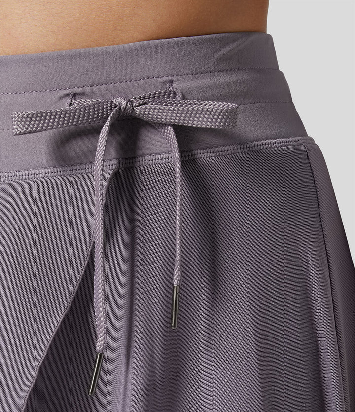 2-in-1 Damen Midi-Rock, hochtailliert, fließender Stoff, ideal für jeden Anlass.
