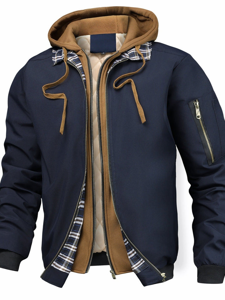 Mann trägt moderne Herren Bomberjacke mit Kapuze, lässig und stilvoll. Perfekt für Freizeit & Outdoor.