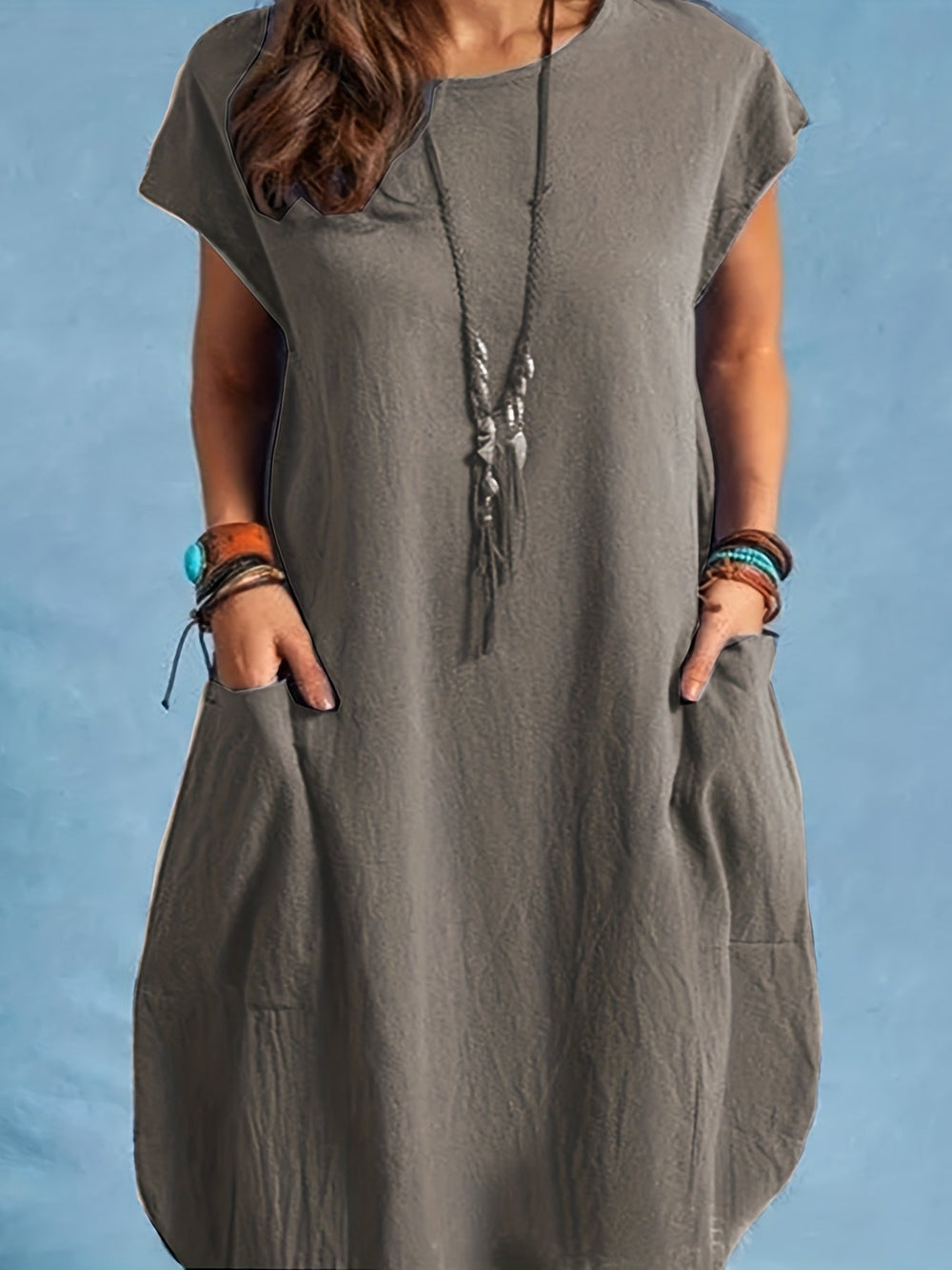 Kurzarm Tunika Sommerkleid für Damen, locker geschnitten, mit Taschen. Ideal für entspannte Tage oder den Urlaub.