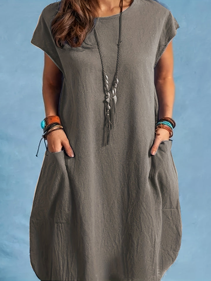 Kurzarm Tunika Sommerkleid für Damen, locker geschnitten, mit Taschen. Ideal für entspannte Tage oder den Urlaub.