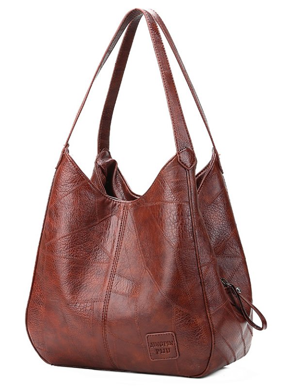 Modische PU Schultertasche für Damen: geräumig, mit Reißverschluss & eleganter Schnalle.