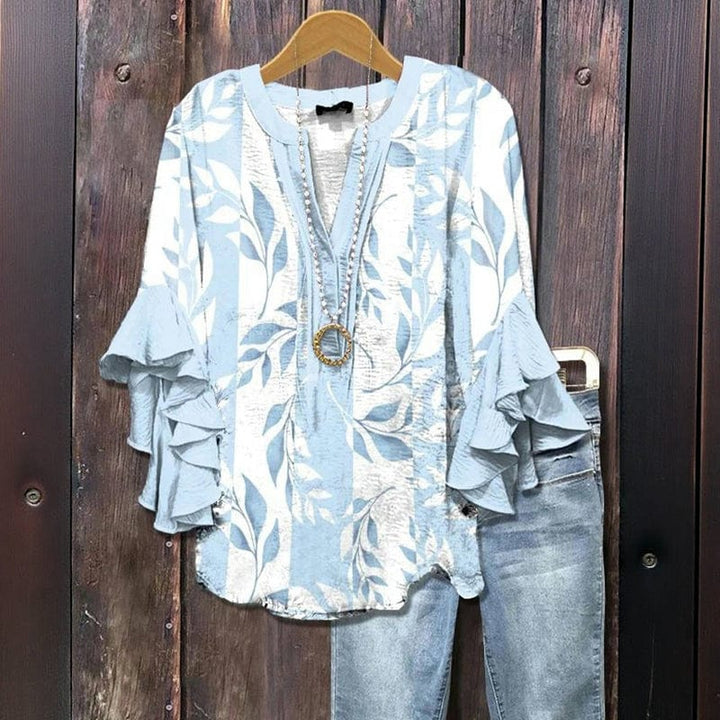 Modische Damen Langarmbluse mit Blumenmuster, Rüschenärmeln und Rundhalsausschnitt. Frühling & Sommer.
