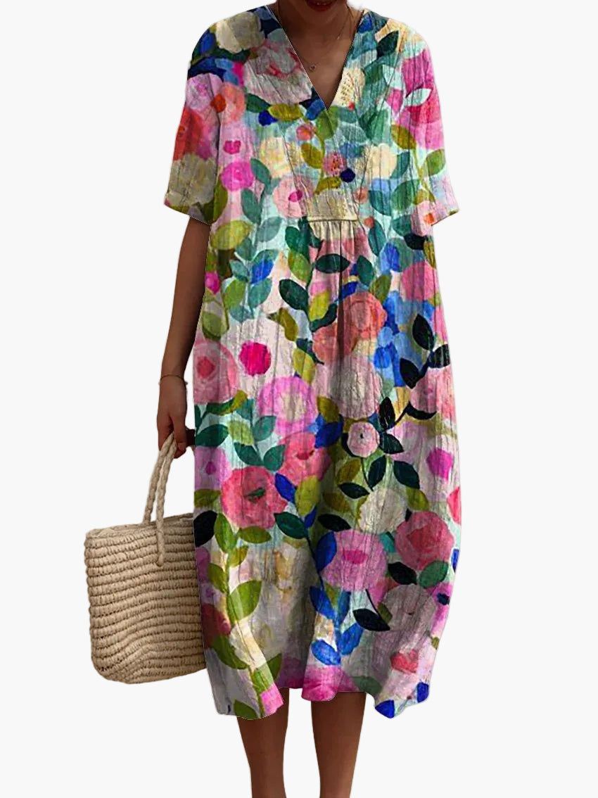 Elegantes Damen Sommerkleid im Vintage-Stil, mit floralem Muster und kurzen Ärmeln, perfekt für Freizeit & Urlaub.