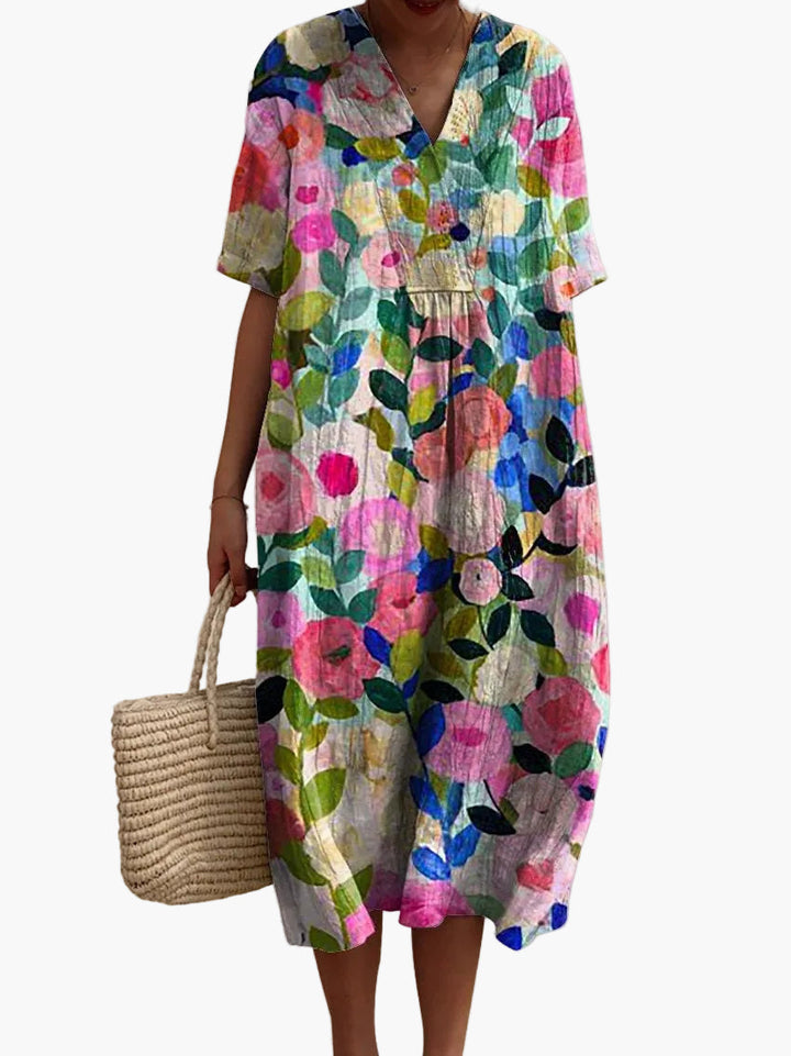Elegantes Damen Sommerkleid im Vintage-Stil, mit floralem Muster und kurzen Ärmeln, perfekt für Freizeit & Urlaub.