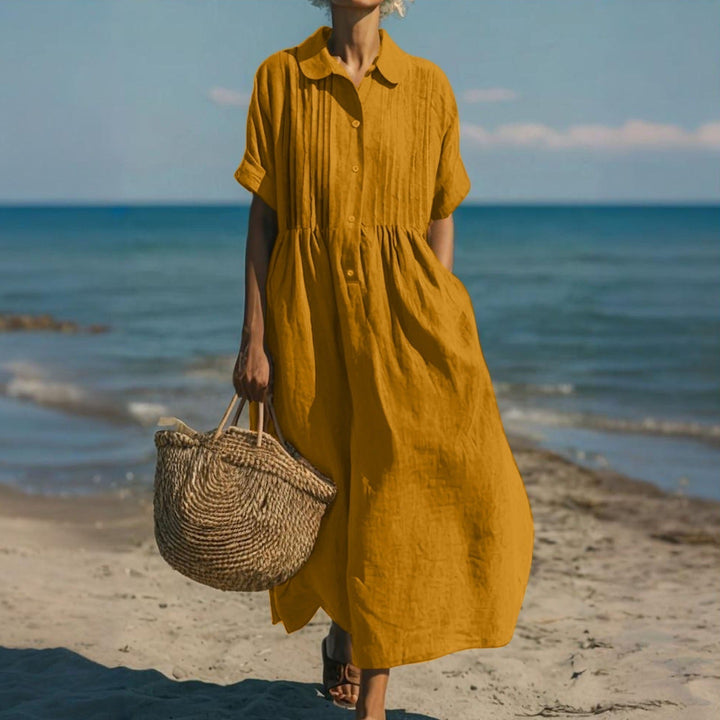 Sommerliches Damen Maxikleid mit zierlichem Pintuck-Kragen und durchgehender Knopfleiste.