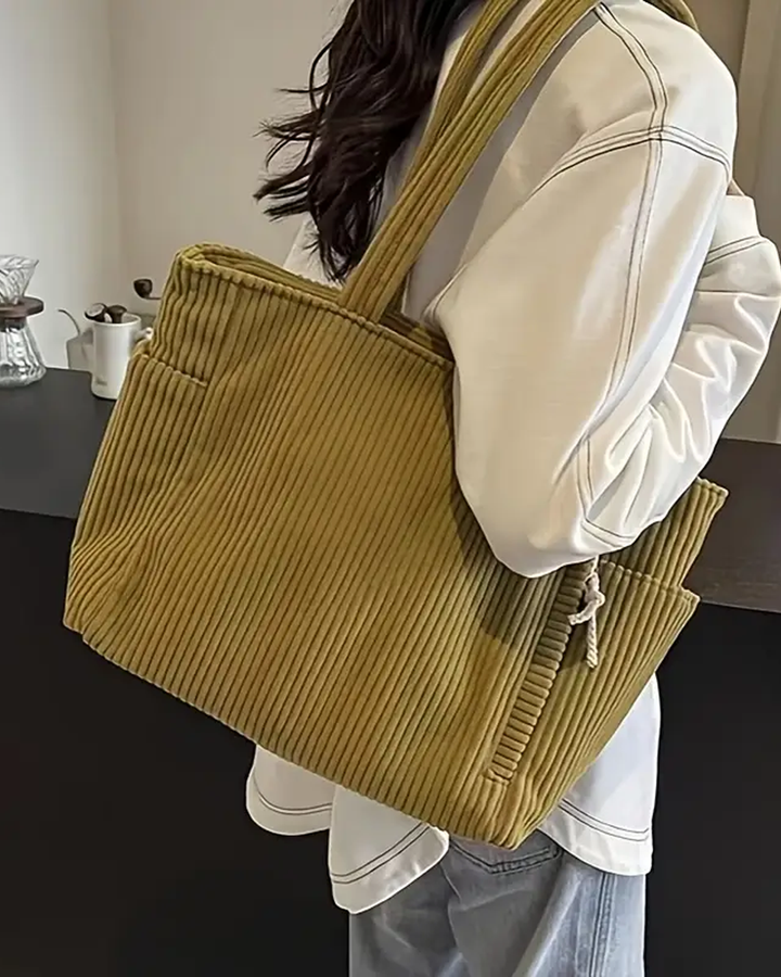 Modische gerippte Damen Tragetasche in Weiß, ein vielseitiges Accessoire für jeden Anlass.