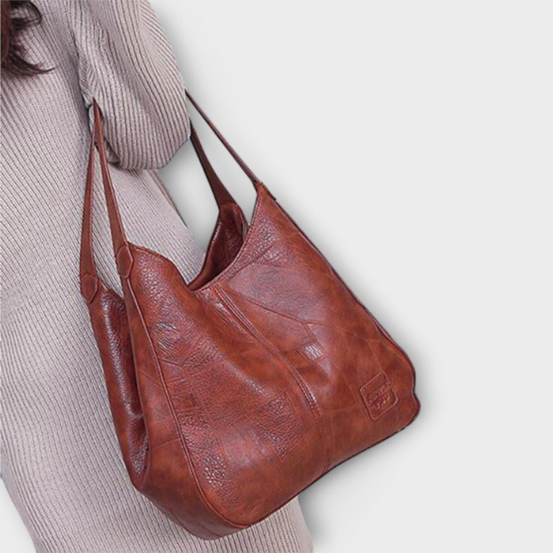 Unisex Vintage Schultertasche aus braunem Leder, bequem zu tragen, perfekt für Business & Freizeit.