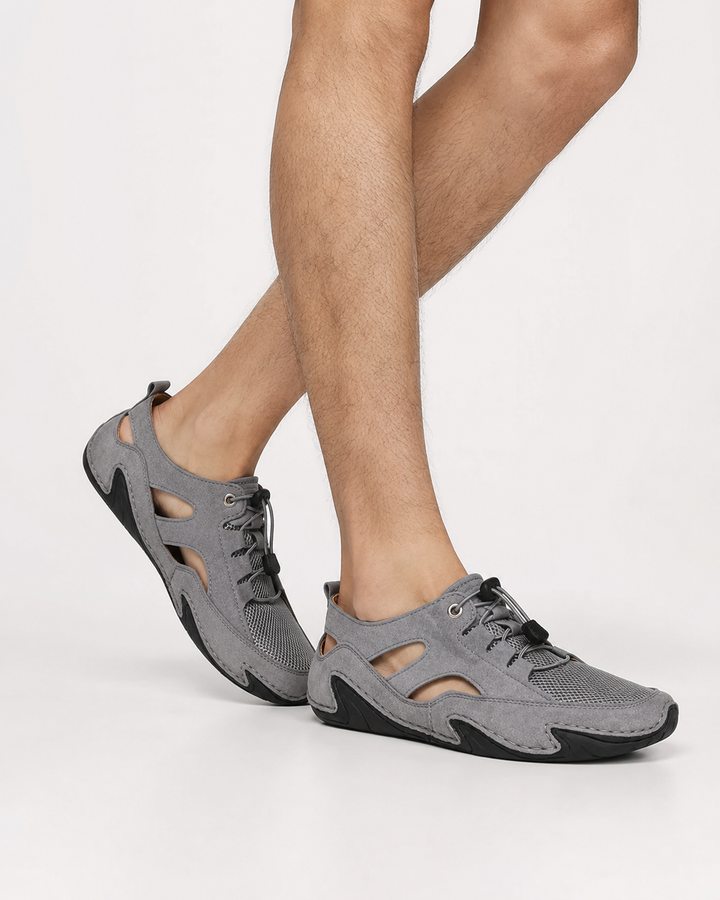 Elegante Herren Fahrerschuhe in Grau mit flacher Sohle. Komfortable Luxus Sneakers für Herren.
