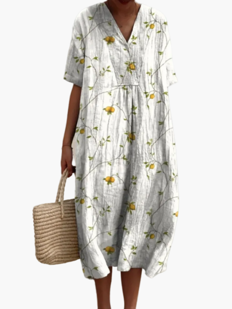 Elegantes Vintage Sommerkleid für Damen mit Blumenmuster, kurze Ärmel, ideal für einen stilvollen Auftritt.