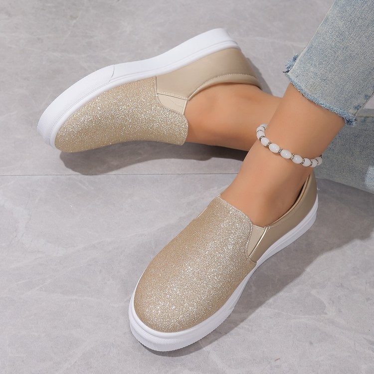 Komfortable Damen Slipper mit glitzernden Pailletten. Elegante und bequeme Freizeitschuhe.