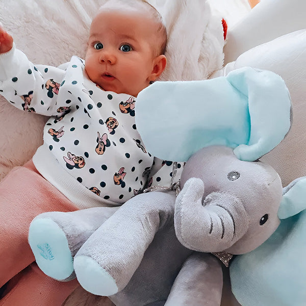 Lustiger Plüschelefant Ellie, interaktives Spielzeug, das singt und mit den Ohren wackelt.
