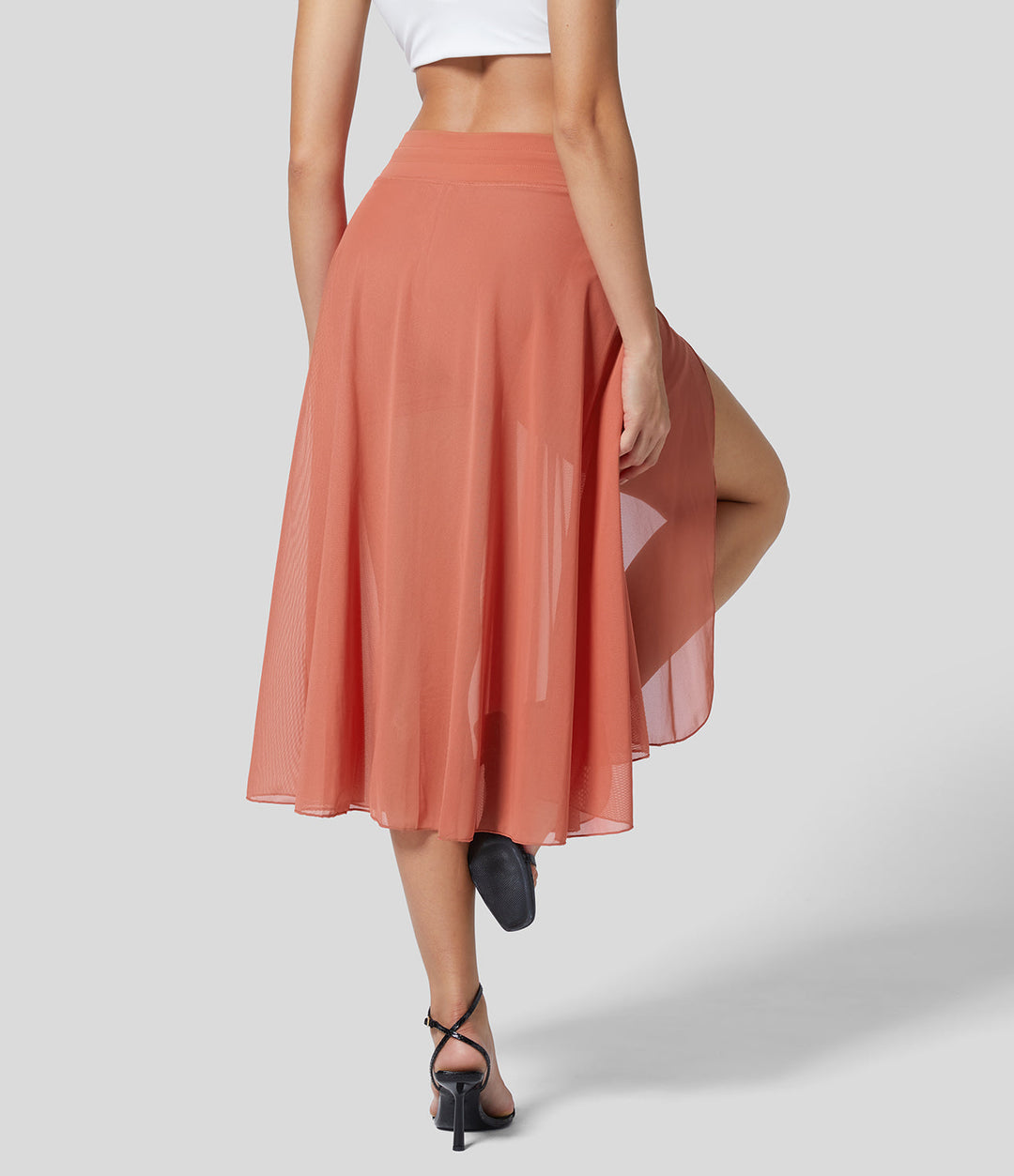 Moderner Damen-Midi-Rock, hochtailliert, fließend, ideal als Strand- oder Freizeitrock.