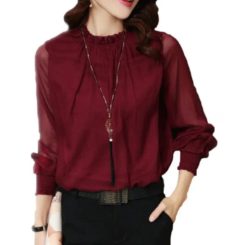 Damen Rüschenbluse mit langen Ärmeln, ideal für ein feminines Büro-Outfit.
