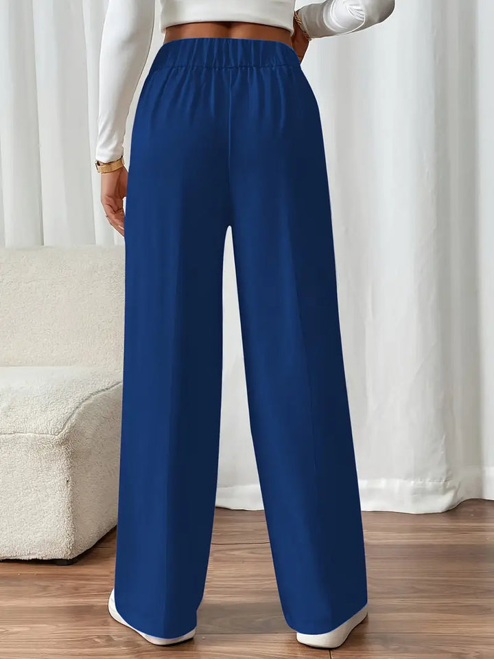 Casual Damenhose, weites Bein, Gummibund. Weich fließendes Material für entspannte, stilvolle Outfits.