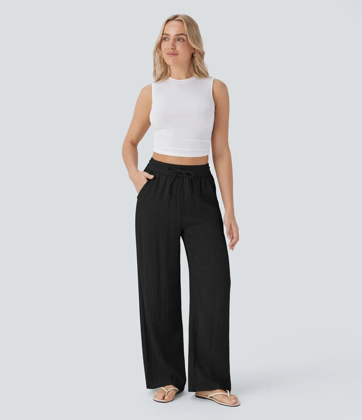Stilvolle Freizeithose Damen: weites Bein, Kordelzug. Elegante Sommerhose mit Seitentaschen.