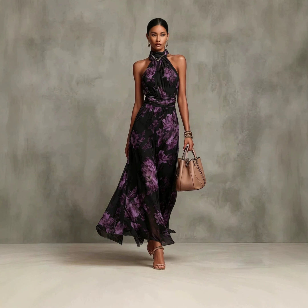 Langes Damen Printkleid mit Neckholder-Ausschnitt, hohem Bund, ärmellos, fließend und farbenfroh für den Sommer.