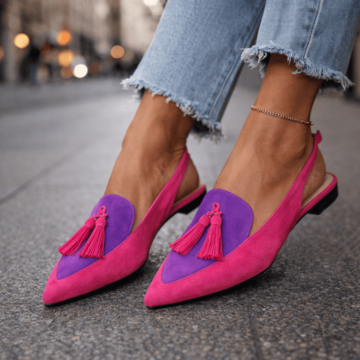 Sommerliche Damen Sandalen mit zarten Riemchen & stylischen Quasten, optimal für warme Tage.