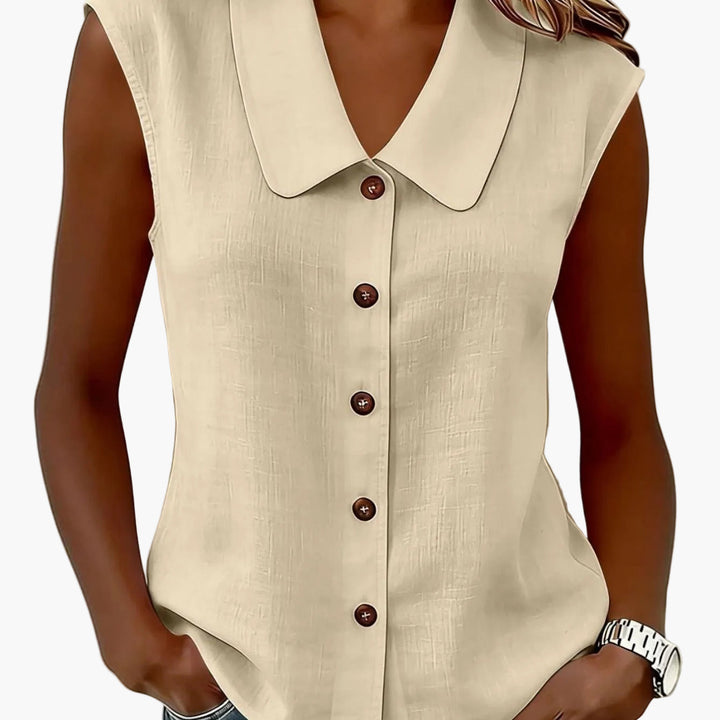 Schlichtes ärmelloses Damen Top mit klassischem Kragen und Knopfleiste, zeitlos elegant.