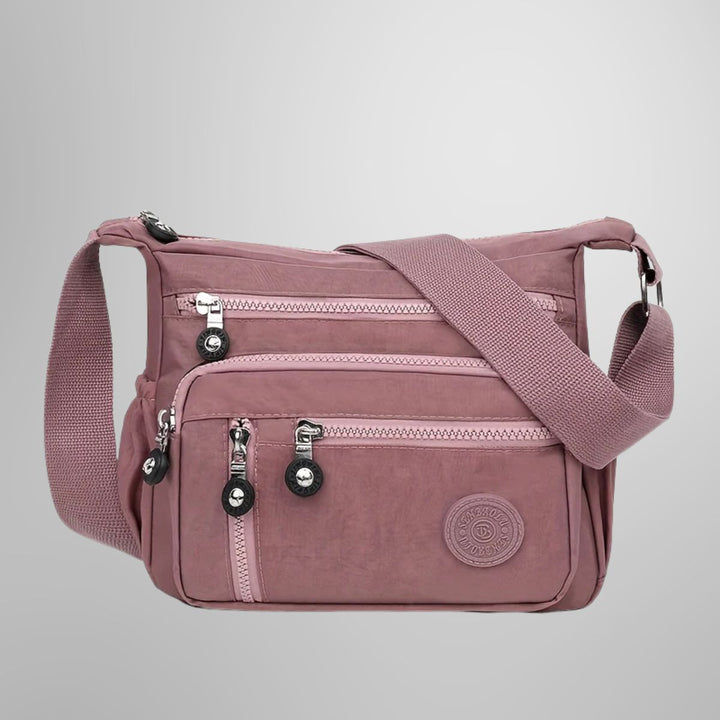 Praktische Damen Handtasche mit Organizer-Fächern. Hält Essentials griffbereit im Alltag.