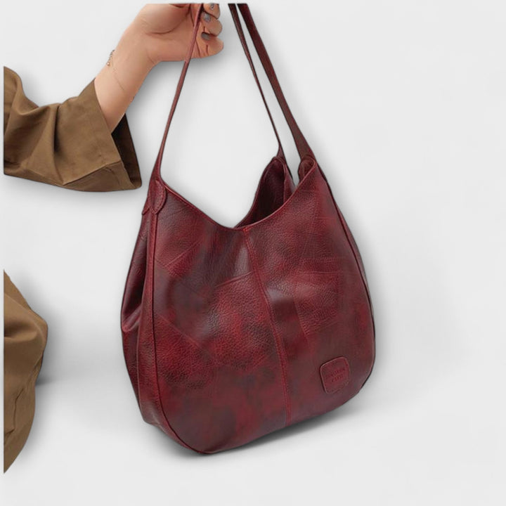 Elegante Vintage Handtasche aus braunem Leder, unisex, vielseitig für Business & Alltag.