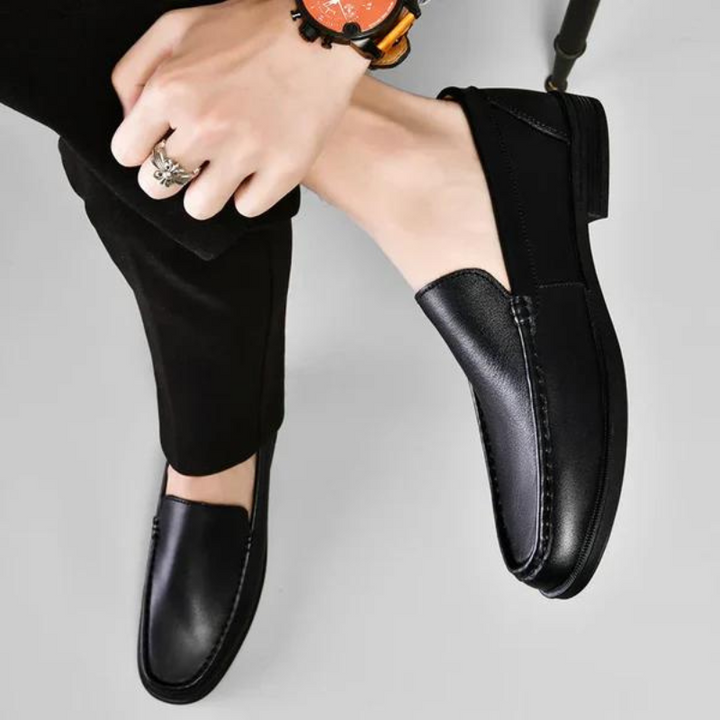 Klassische graue italienische Herren Slipper, elegantes Design aus echtem Leder für jeden Anlass.