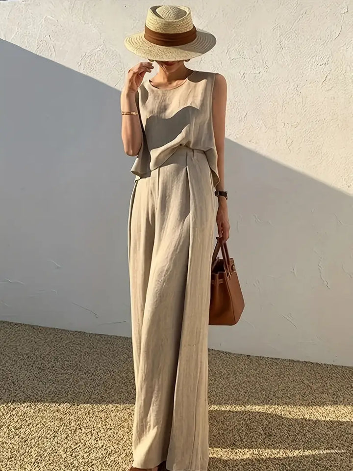 Stylischer Damen Leinen Zweiteiler mit ärmellosem Oberteil und Hose, ideal für Sommer, Casual & Urlaub.