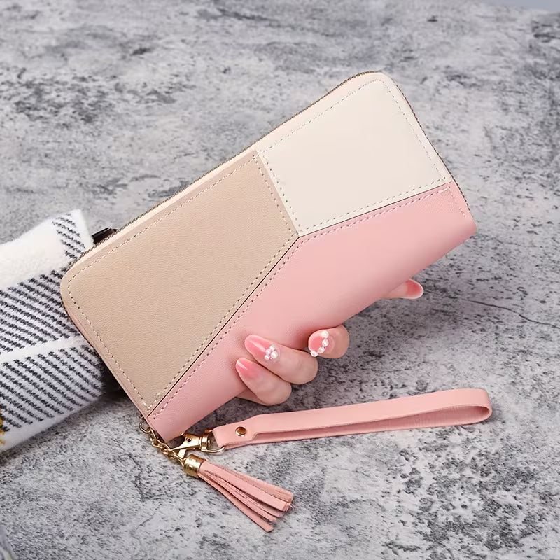 Elegantes Damen Portemonnaie mit Handschlaufe, funktionalem Design & vielen Fächern. Perfekt für Karten & Münzen.