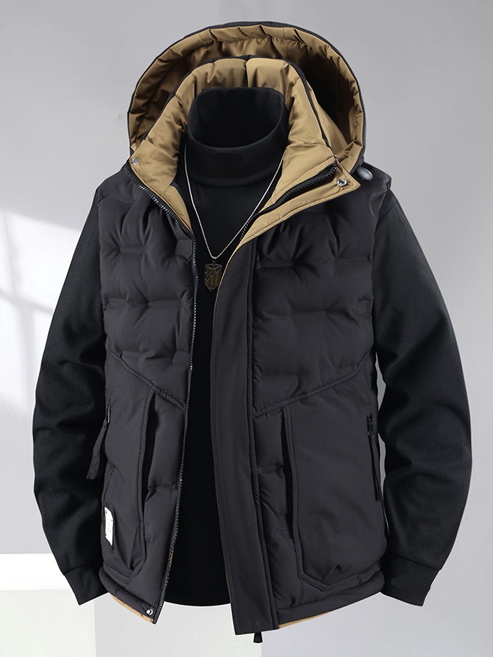 Warm wattierte Herrenweste mit Steppmuster und praktischer Kapuze, perfekt für Outdoor-Abenteuer.