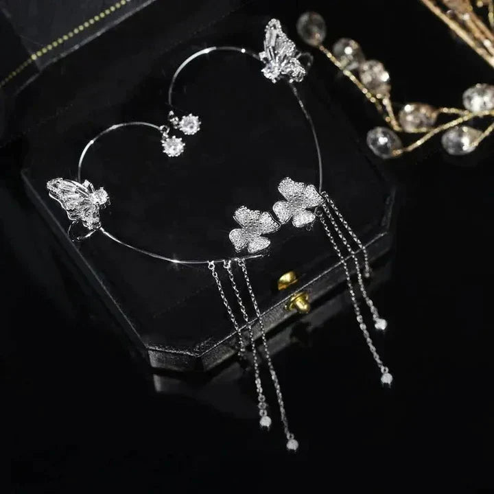 Eleganter Schmetterlings-Ohrclip in Silber mit glitzernden Zirkonia, für Damen ohne Piercing.