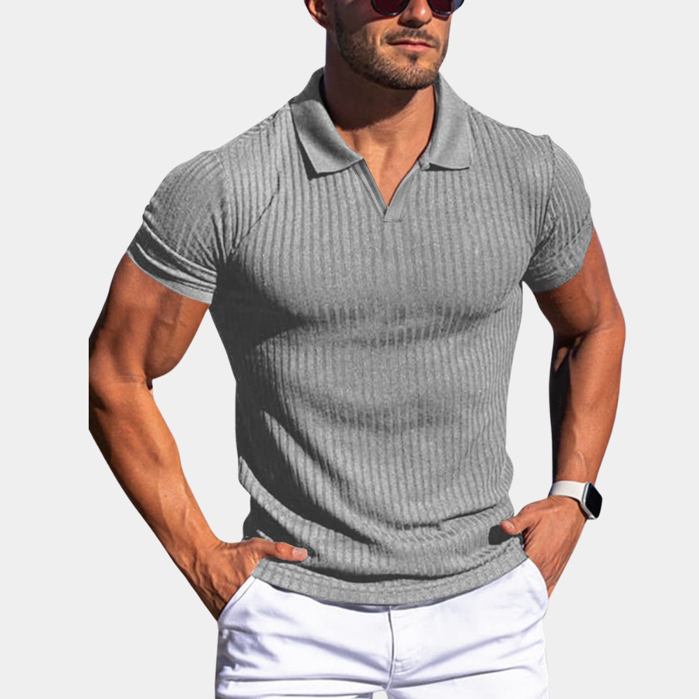 Figurbetontes Herren-Poloshirt, atmungsaktiv & elegant, ideal für den Sommer. Kurzarm mit stilvollem Rippdesign.
