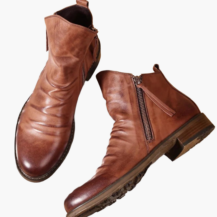 Elegante schwarze Herren Stiefeletten mit Seitenreißverschluss, perfekt für Business & Alltag, bieten Komfort.