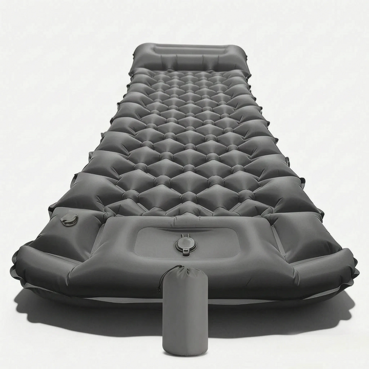 Ultraleichte aufblasbare Isomatte mit integriertem Kissen, optimiert für Trekking und Rucksackreisen.