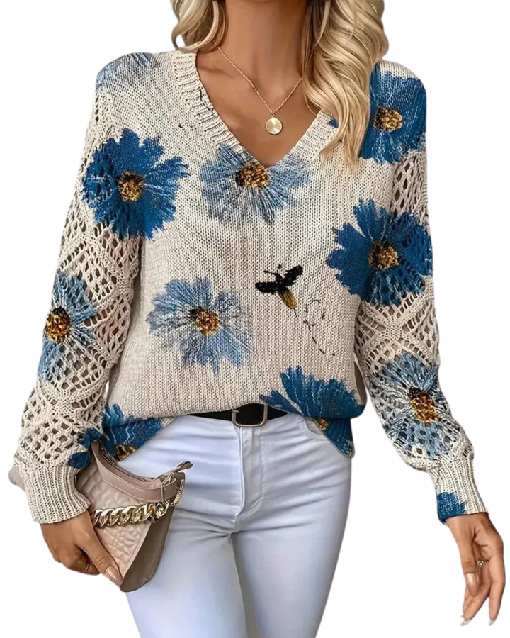 Eleganter Damen Pullover mit lebhaftem Blumenmuster. Stylisher V-Ausschnitt für Freizeit & Komfort im Frühling.