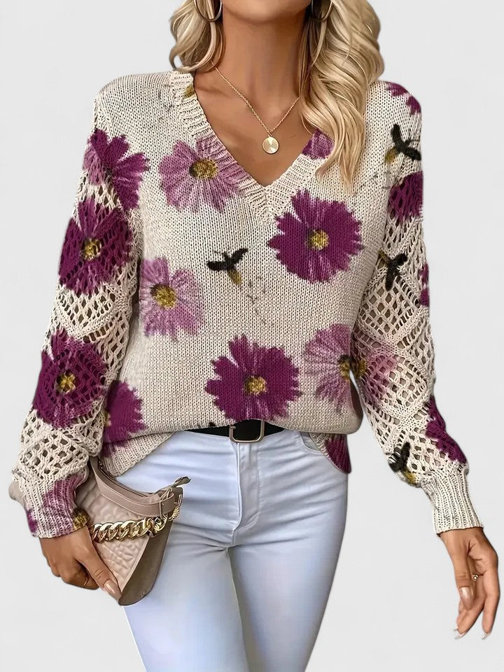 Bequemer Damen Pullover für Frühling & Herbst. Mit farbenfrohem Blumenmuster und modischem V-Ausschnitt.