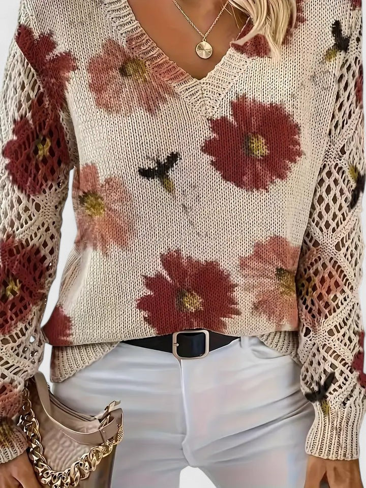 Damen Pullover mit schickem V-Ausschnitt & Blumenmuster. Ein eleganter Strickpullover für den Alltag.