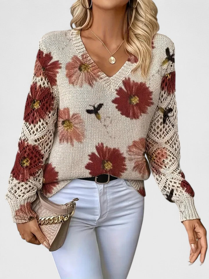 Modischer Damen Strickpullover mit floralem Muster. V-Ausschnitt Design, ideal für Frühling und Übergangszeit.