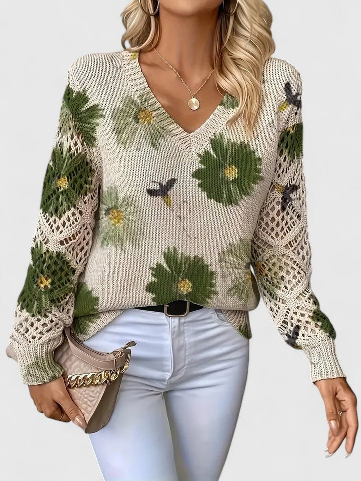 Hochwertiger Damen Strickpullover mit farbenfrohem Blumenmuster und V-Ausschnitt. Elegant und bequem.