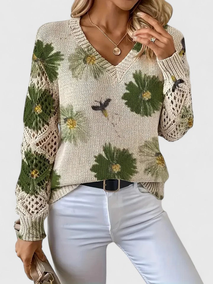 Damen Pullover mit attraktivem Blumenmuster & V-Ausschnitt. Weicher Strick für stilvolle Frühlingstage.