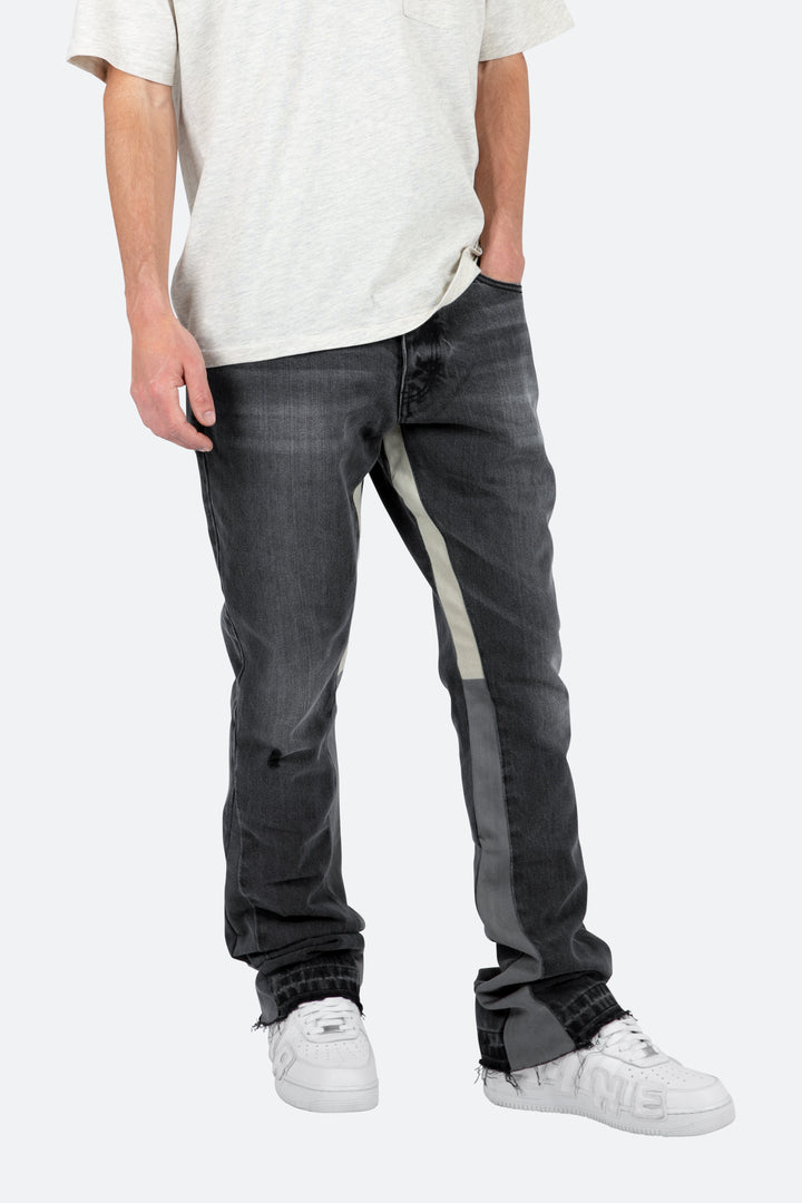 Schwarze Herren-Schlaghose mit Washed-Look und stylischen Kontrasteinsätzen; modern & bequem für Freizeit.