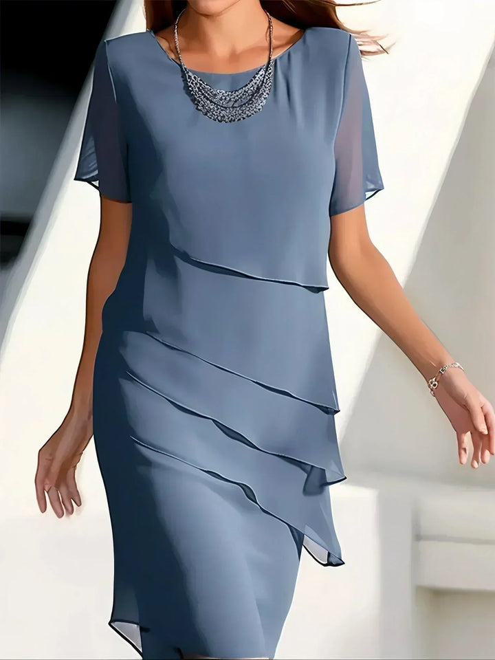 Festliches Midikleid, elegant geschnitten, perfekt für Damen bei Feierlichkeiten.